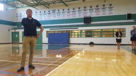 Daniel describing the injury that changed his life to students and teachers at Springbank Community High School